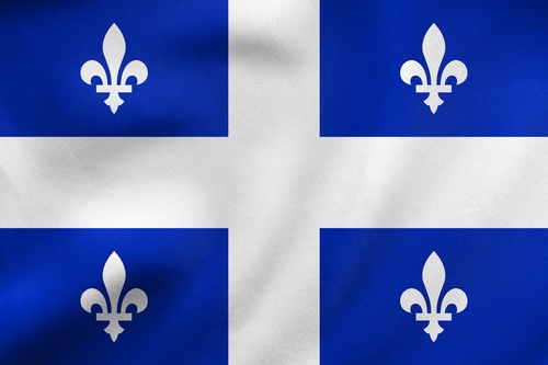 Flag of Quebec waving, real fabric texture